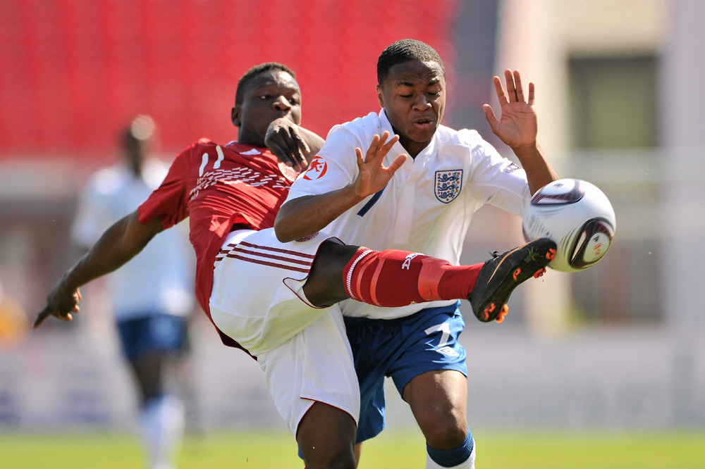 Liverpool's Raheem Sterling battles for the ball for England U17s against Denmark 